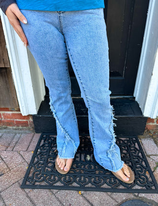 EVERSTRETCH FLARE JEANS WITH CROSSOVER FRINGE