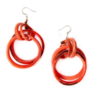 Gorgeous cascade of hoops handmade by Ecuadorian artisans. Pairs perfectly with our Bonnie necklace. 
Approximately 2.5" L
Materials: Sustainable Tagua nut
Ear wires are hypoallergenic, nickel free, and lead free
Organic Vegetable Dyes
Handmade in Ecuador
Due to the nature and size of the tagua nuts, all sizes are approximate…not exact.
Colors may vary from the pictures slightly due to the nature of the Tagua Nut.